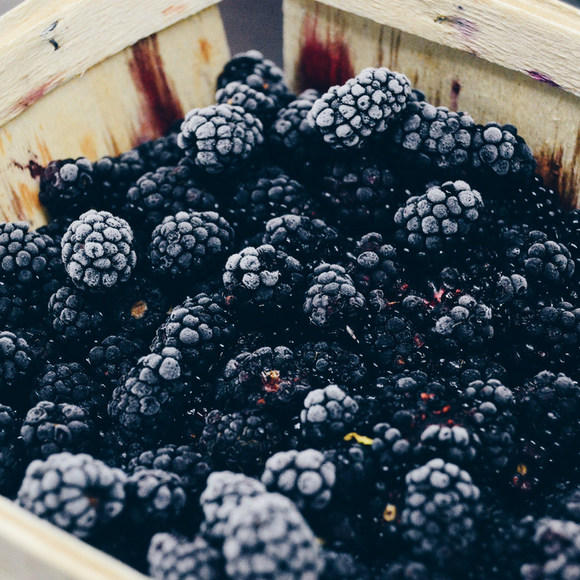 Basket of frozen blackberries