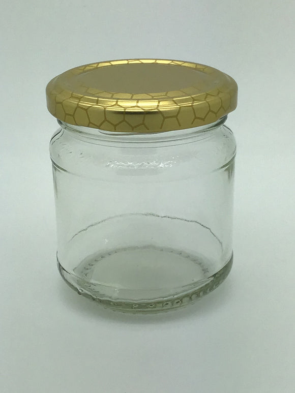 1/2lb Round Honey Jars with fancy embossed pattern to base of neck
